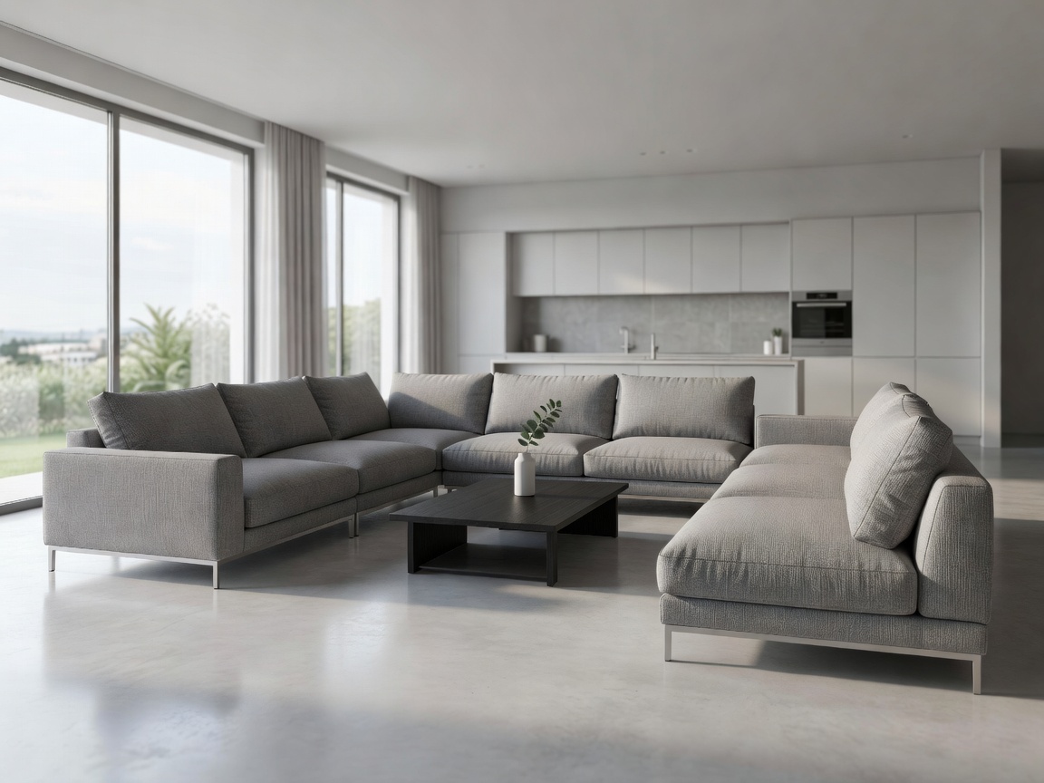 A large, modern modular sofa arranged in a U-shape in an open plan living area